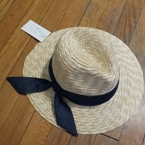 New with tags straw hat with navy ribbon